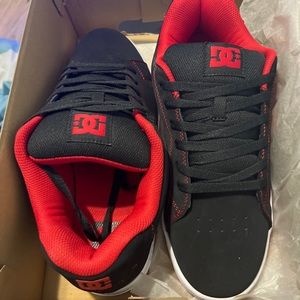 Black and red DC shoes